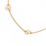 A high intensity photo of the unique gold fill ball chain and pearls on the bracelet.